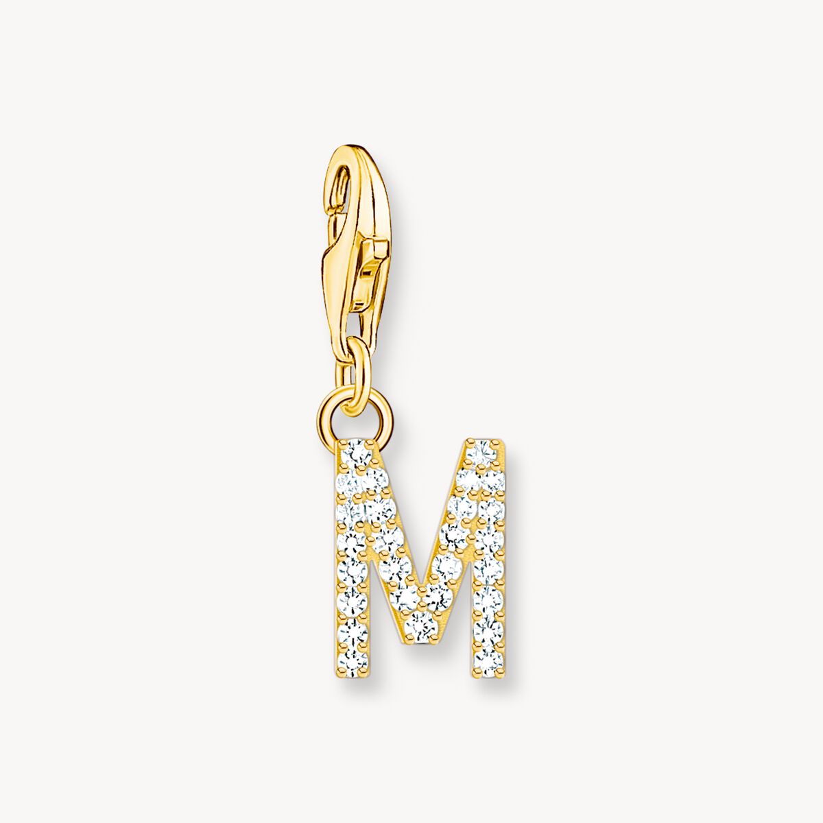 Thomas Sabo - Charm-hängsmycke bokstaven M med vita stenar guldpläterad